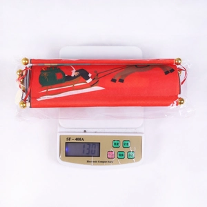 Detailed view of 130g Christmas Santa banner rolled in clear plastic packaging