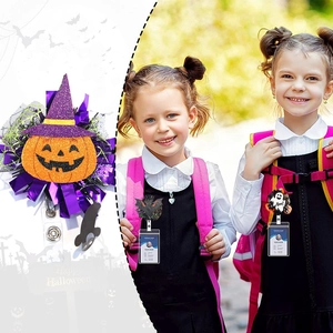 Halloween retractable badge holder set with glitter pumpkin, bat, and ghost motifs