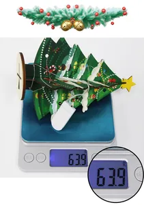 Weight measurement of wooden Christmas tree decor with LED lights showing 63.9 grams