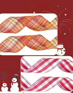 Close-up of rustic orange and red plaid linen ribbons with stitched edges for Christmas DIY