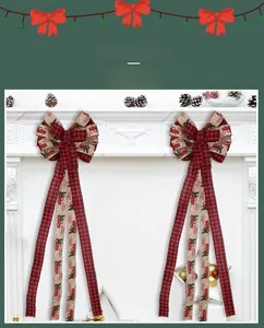 Detail of red-black plaid and beige Merry Christmas ribbons with vintage truck print
