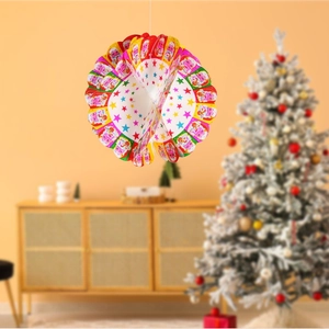 Detail of Santa Claus honeycomb ball ornament with colorful stars for festive party decor