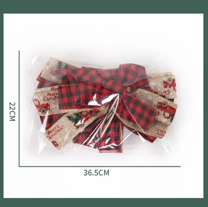 Detail view of buffalo plaid Christmas bow measuring 36.5x22cm for tree topper decoration