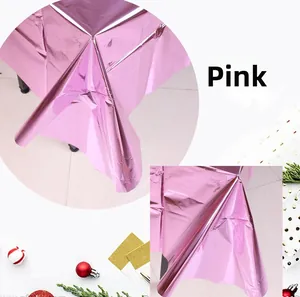 Pink metallic foil tablecloth detail showing glossy finish for birthday party decor