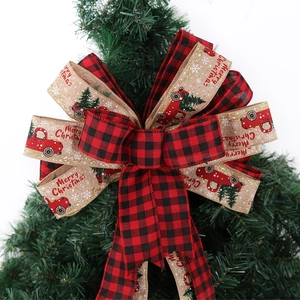 Double-layered buffalo plaid Christmas tree topper bow with vintage red truck design