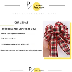 Detail of red and black plaid Christmas bow with gold edges held by hand in two sizes
