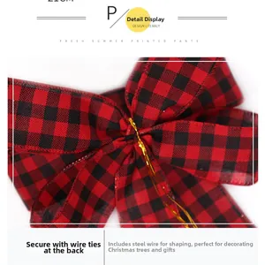 Detail of red and black buffalo plaid Christmas bow with flexible wire and gold twist tie