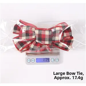 Weight display of a red and black plaid Christmas bow with red glitter edges