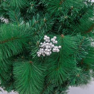 Silver metallic Christmas berry cluster ornaments on artificial pine branch for holiday decor
