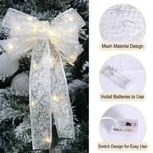 Luminous white mesh Christmas tree bow topper with LED lights and snowflake patterns