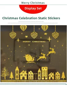 Macro detail of gold glitter Christmas window static stickers with reindeer and snowflakes