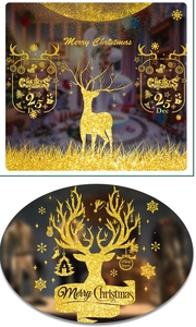Detail of gold glitter Christmas window stickers featuring reindeer and snowflake patterns