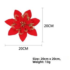 Detail of a 20cm red artificial Christmas poinsettia with gold glitter hollowed edges