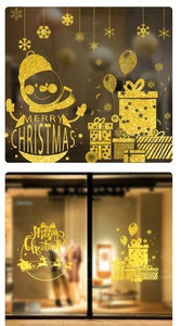 Gold glitter Christmas window stickers featuring snowmen, gift boxes, and snowflakes