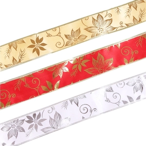 Detailed view of champagne, red and white satin ribbons with gold poinsettia floral prints