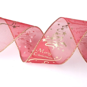 Red Christmas mesh ribbon with golden Merry Christmas prints and stars for gift wrapping