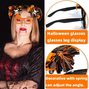 Halloween party glasses with orange glitter frames and skull pumpkin spring pom-poms