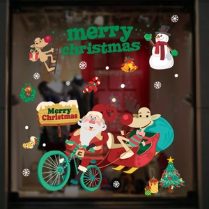 Detail showing cartoon Santa on bicycle and reindeer static window stickers for Christmas