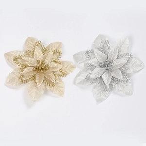 Close-up of champagne and silver artificial Christmas poinsettias with glitter details