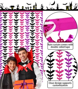 Detail of bat-shaped Halloween rain curtain showing top adhesive tape for easy wall mounting