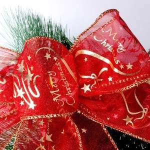 Red sheer Christmas ribbon with gold Merry Christmas print and wired gold edges