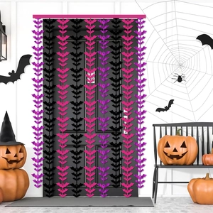 Close-up of Halloween bat string curtains in black, purple, and pink for party decor