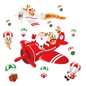 Christmas window stickers featuring Santa in a plane with reindeer and Merry Christmas text