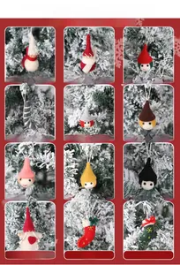 Detail view of 12 felt Christmas ornaments including Santa, snowman and striped stockings