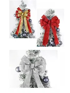 Close-up of glittered Christmas tree bows in red, gold and silver for holiday decoration