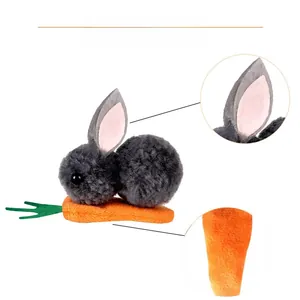 Detailed macro view of plush Easter bunny hair clip texture and carrot accent