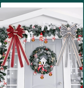 Classic buffalo plaid Christmas bows hanging on a festive holiday door wreath set