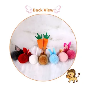 Back view detail of plush Easter bunny tails and carrots accessories on soft white background