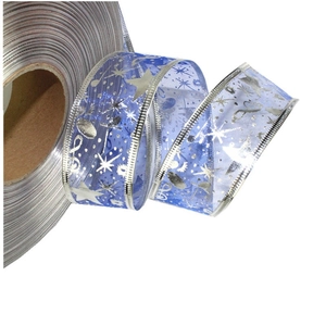 Detailed macro view of 3.8cm blue organza ribbon with silver stars and wired edges