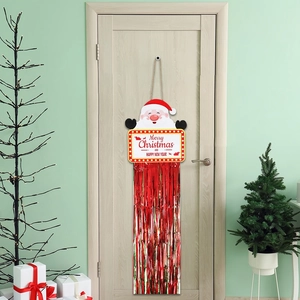 Panneau de porte Père Noël de Noël avec texte festif et franges en guirlandes rouges