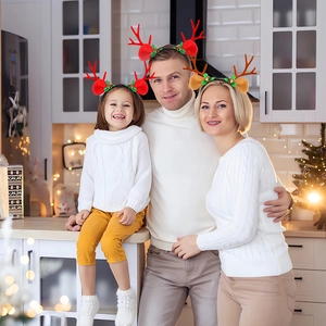 Christmas reindeer antler headband with sequins and berries for festive party decoration