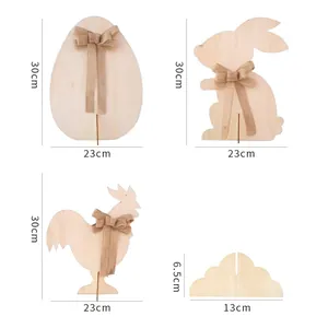 Decorazioni pasquali in legno con coniglietto, gallo e uovo su basi in legno