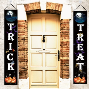 Detailed view of Halloween Trick or Treat door banners with pumpkin and ghost motifs