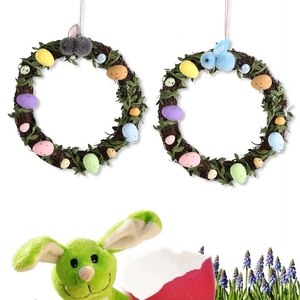 Easter wreath with natural vine, colorful speckled eggs and plush rabbit hanging ornaments