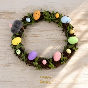 Easter wreath with pastel eggs, green leaves, and a plush bunny on a digital scale