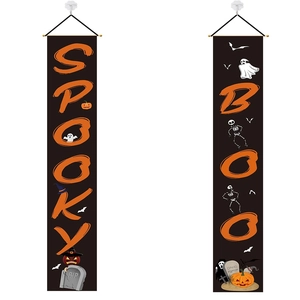 Close-up of Halloween door banners featuring Spooky and Boo text with pumpkin motifs