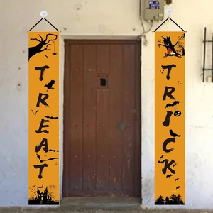 Detail of Halloween door banners featuring Trick or Treat text and festive pumpkin graphics