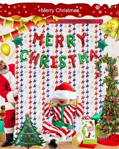 Detail of red white and blue bird tassels with Merry Christmas foil balloon decorations