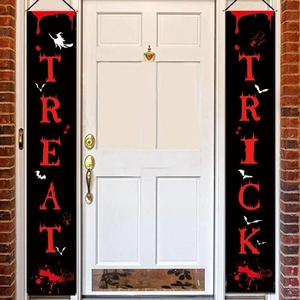 Detail of Trick or Treat Halloween door banners with blood splatter and bats design