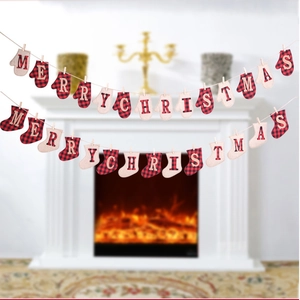 Close-up of buffalo plaid Christmas mitten bunting with Merry Christmas letters on fireplace