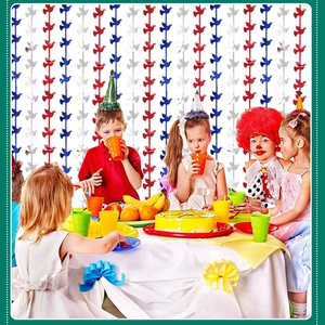 Christmas party fringe curtain with red and blue peace dove paper garlands background