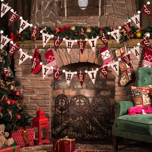Rustic Christmas bunting banner with Merry Christmas letters on burlap and plaid fabric