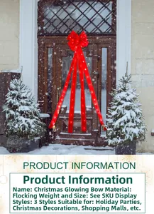 Détail d'un grand nœud de Noël rouge lumineux en velours avec LED pour décoration