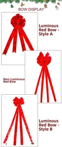 Détail d'un grand noeud de Noël en velours rouge avec lumières LED et bordure dorée