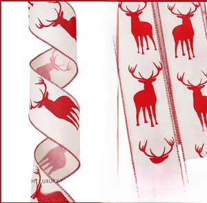 Detail of Christmas ribbon featuring red reindeer patterns and stitched edges for tree decor