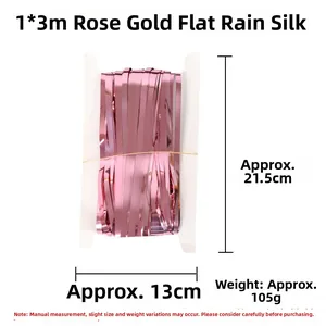 Detailed view of 1x3m rose gold foil fringe curtain packed on white cardboard